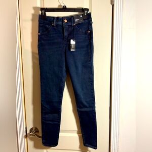Express jeans, cropped skinny mid rise, size 0R, color dark blue.